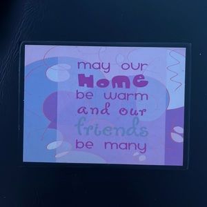 Cute sign “may our home be warm and our friends be many”